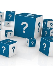 A set of cubes with question marks on them