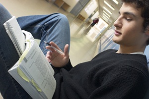 Student studying a book